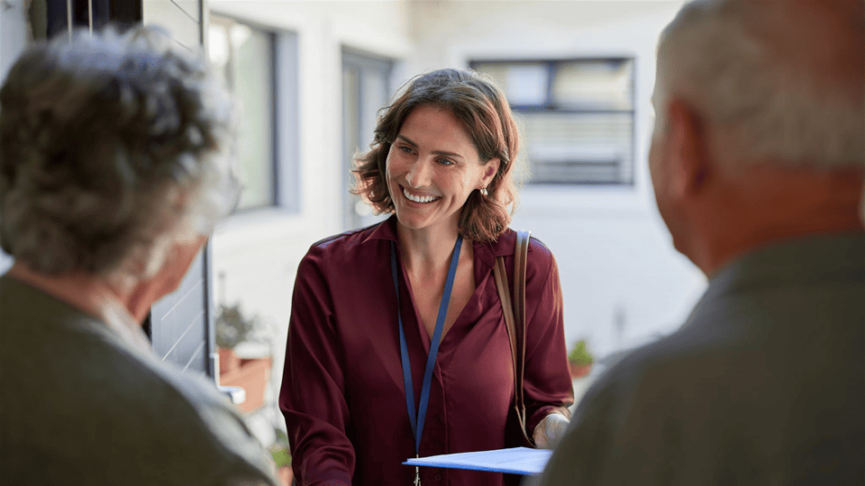 Medical social worker consulting with family